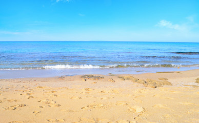 Fototapeta na wymiar Lu Bagnu shoreline on a clear day