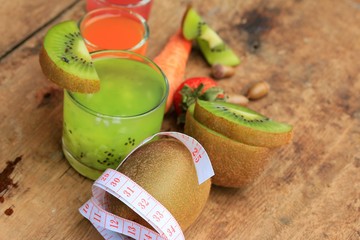 fresh kiwi juice and strawberry on wood vintage