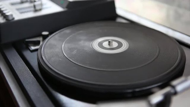 disk spinning disk player of music CDs, disco, records