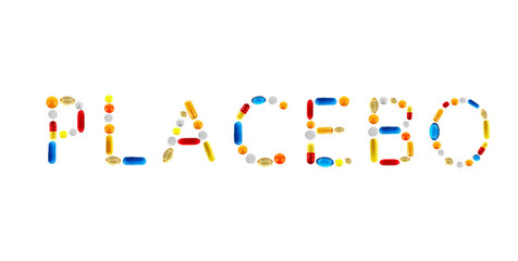 The word Placebo made with pills isolated on white