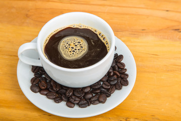 Coffee cup with beans