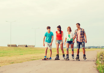 group of smiling teenagers with roller-skates