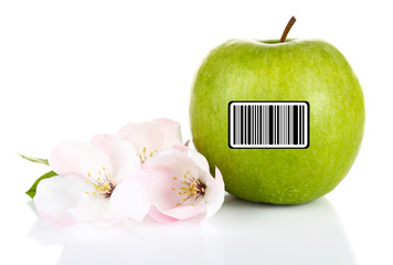 Fresh apple with barcode and apple blossom, isolated on white