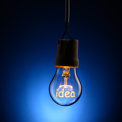 Light bulb on dark background