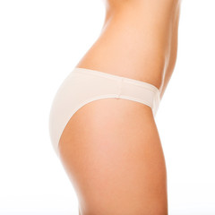 woman in cotton underwear showing slimming concept