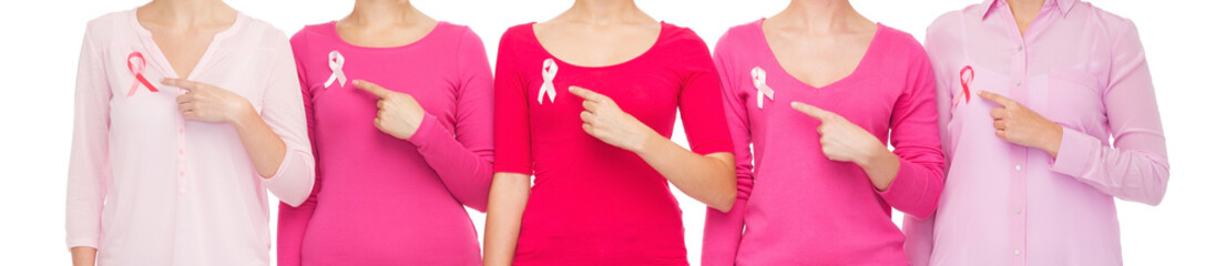 close up of women with cancer awareness ribbons