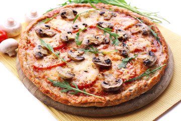 Tasty pizza with vegetables and napkin close up