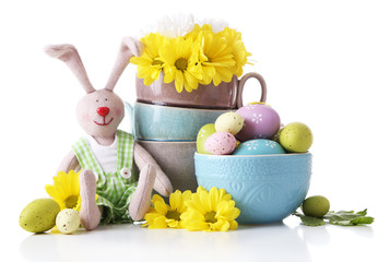 Easter bunny with painted Easter eggs with flowers on white background