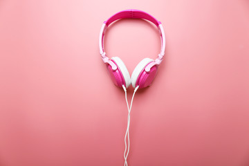 Headphones on pink background