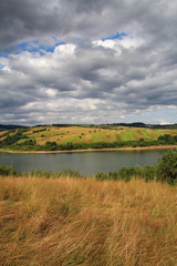 Obraz premium lake and dramatic sky in southern Poland