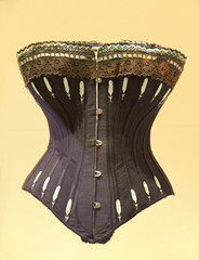 A Black Embroided Vintage Ladies Support Corset. - obrazy, fototapety, plakaty