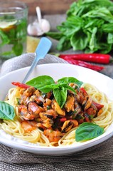 pasta with mussels, pepperoni, bacon, tomato and basil