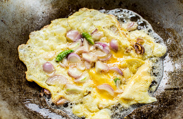 frying garlic in pan