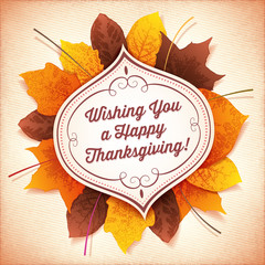 Thanksgiving Greeting Card with a White Label and Autumn Leaves