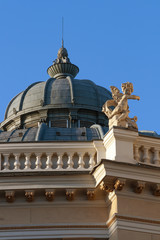 Cherub statue on the roof of Odessa opera theater