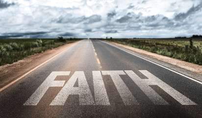 Faith written on rural road