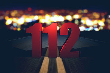 112 emergency number standing on the road - obrazy, fototapety, plakaty