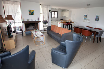 Modern, bright, clean, living room   in a  house