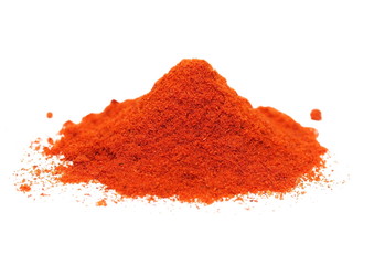 macro pile ground paprika isolated on white background