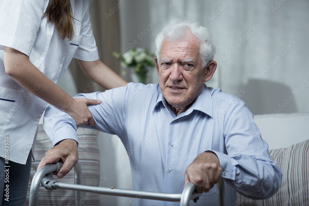 Canvas Prints physiotherapist helping disabled senior man