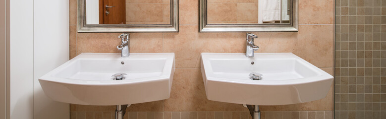 Fototapeta premium Washbasins in modern bathroom