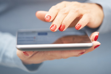 Woman with tablet computer