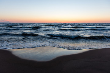 red dramatic sunset on the sea beach