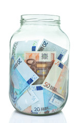 Jar of European Union Currency isolated on white