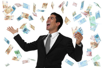Raining money on a surprised businessman