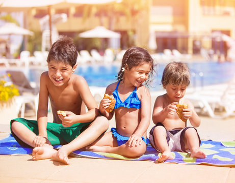 Happy children near the pool