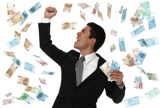 Raining money on an excited businessman