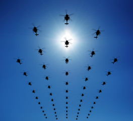 Helicopter silhouette in the sky