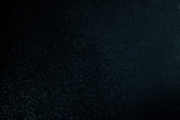 abstract dark bokhe lights background , purple,black and subtle gold. defocused background