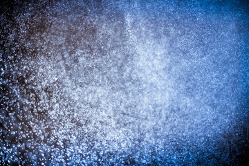 abstract dark bokhe lights background , purple,black and subtle gold. defocused background