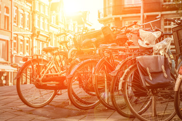 Fototapeta na wymiar Amsterdam view with bicycles under sun light