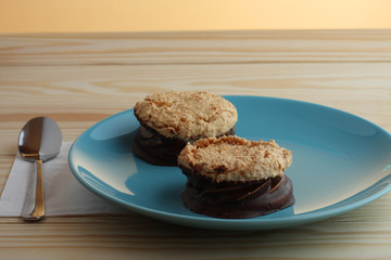  coconut cookies filled jam covered with chocolate