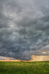 Stormy clouds raining in HDR