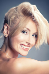 Fototapeta premium Beauty portrait of sensual smiling woman.