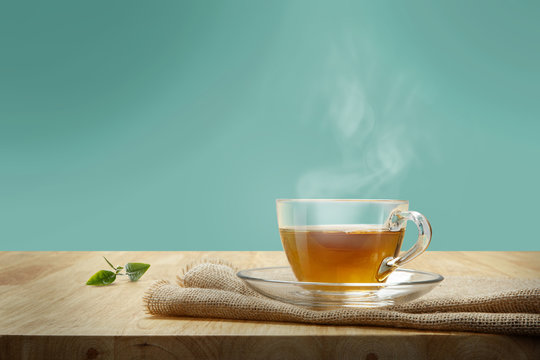 Cup Of Tea With Sacking On The Wooden Table