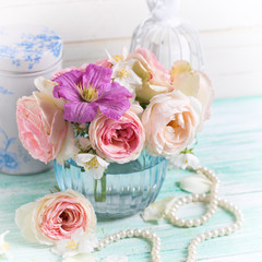 Fototapeta na wymiar Roses, jasmine and clematis flowers