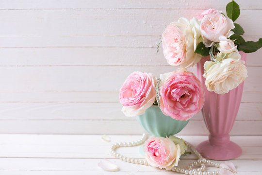 Sweet pink roses flowers in vases