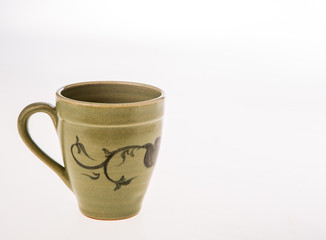 ceramic cup of coffee on white background