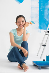 Asian girl with a paint brush