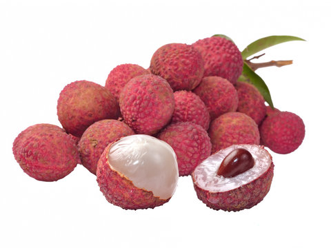 Fresh lychees with leaves isolated on white background