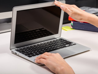 woman closing/opening her laptop