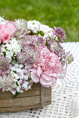 Floral arrangement with pink carnations