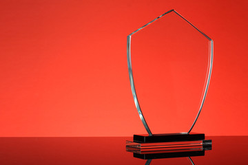 glass trophy in red background