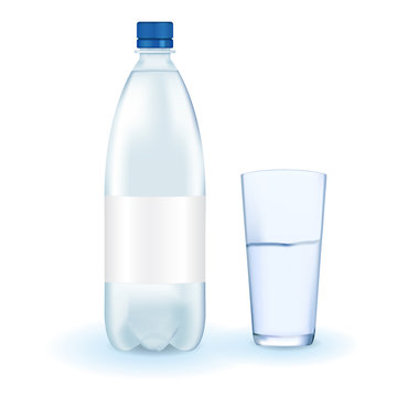 Plastic bottle of drinking water with glass and blank label