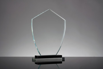 glass trophy in gray background