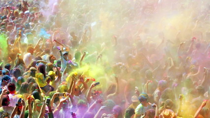 BARCELONA, SPAIN - APRIL 12, 2015: Many happy dirty people at Festival de los colores Holy at Barcelona. It is traditional holiday  of Indian culture